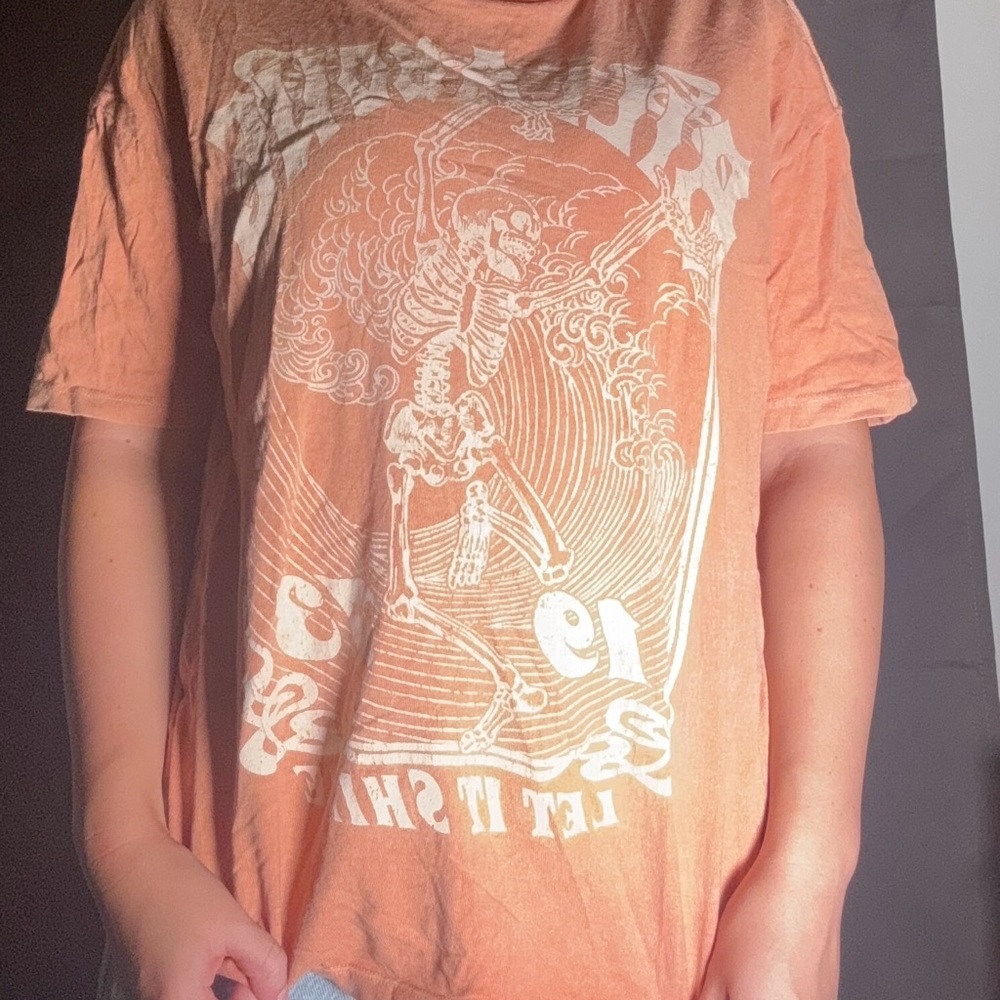 “Billabong” Orange Graphic Tee with Skeleton Design